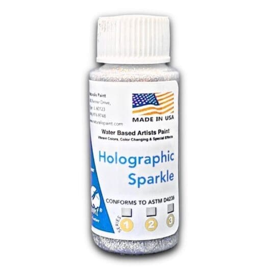 Bottle of "Holographic Sparkle" water-based artist paint, featuring an American flag and text indicating it is made in the USA. The bottle is white with a twist-off cap.