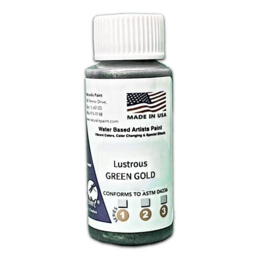 A bottle of water-based artist paint labeled "Lustrous Gold Green" with a "Made in USA" badge and instructions on the bottle.