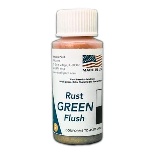 A small bottle of "Rust Green Flush," a water-based artist paint, features an American flag and the text "Made in USA" on its label, along with company details and compliance information.